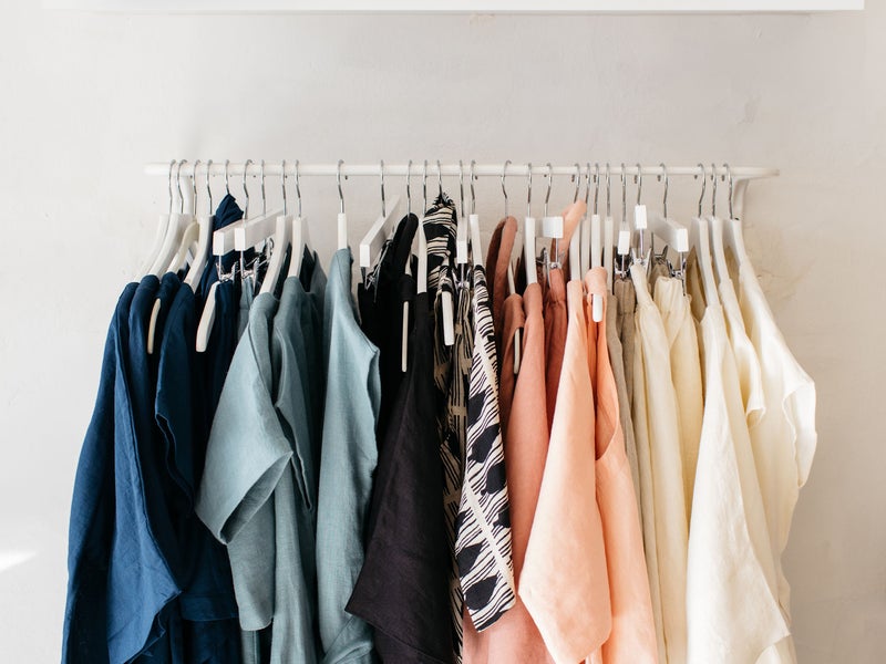 Clothes hanging in a closet