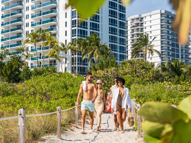 People walking on beach
