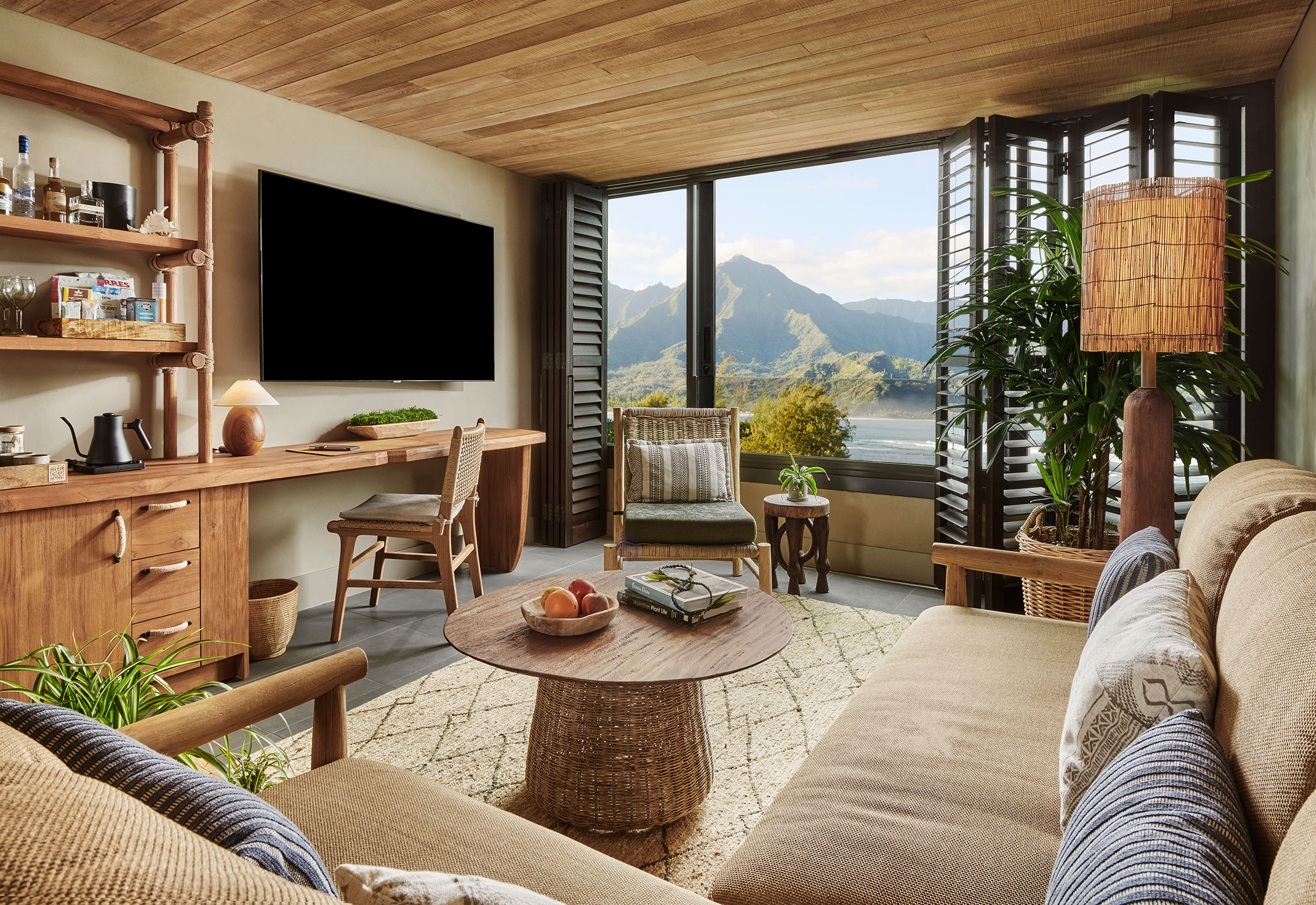 Views inside the ocean studio suite overlooking the mountains in the distance outside