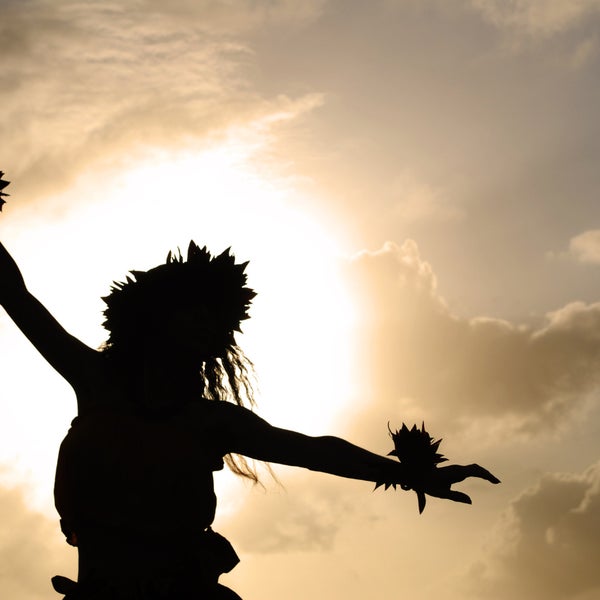 A silhouette of a person dancing
