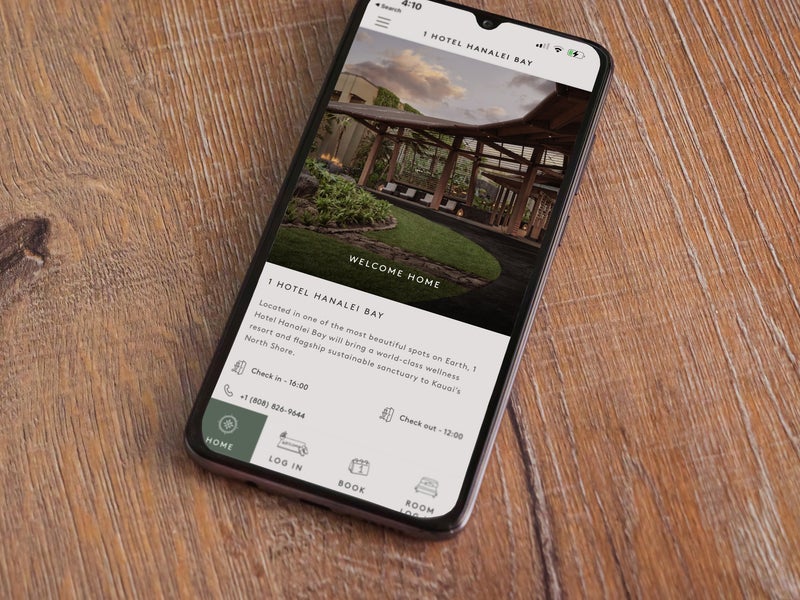 Cellphone with 1 Hotels App loaded on screen