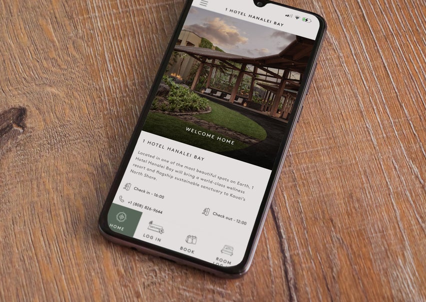 Cellphone with 1 Hotels App loaded on screen