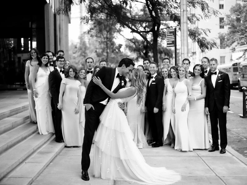 Bride and groom kissing 