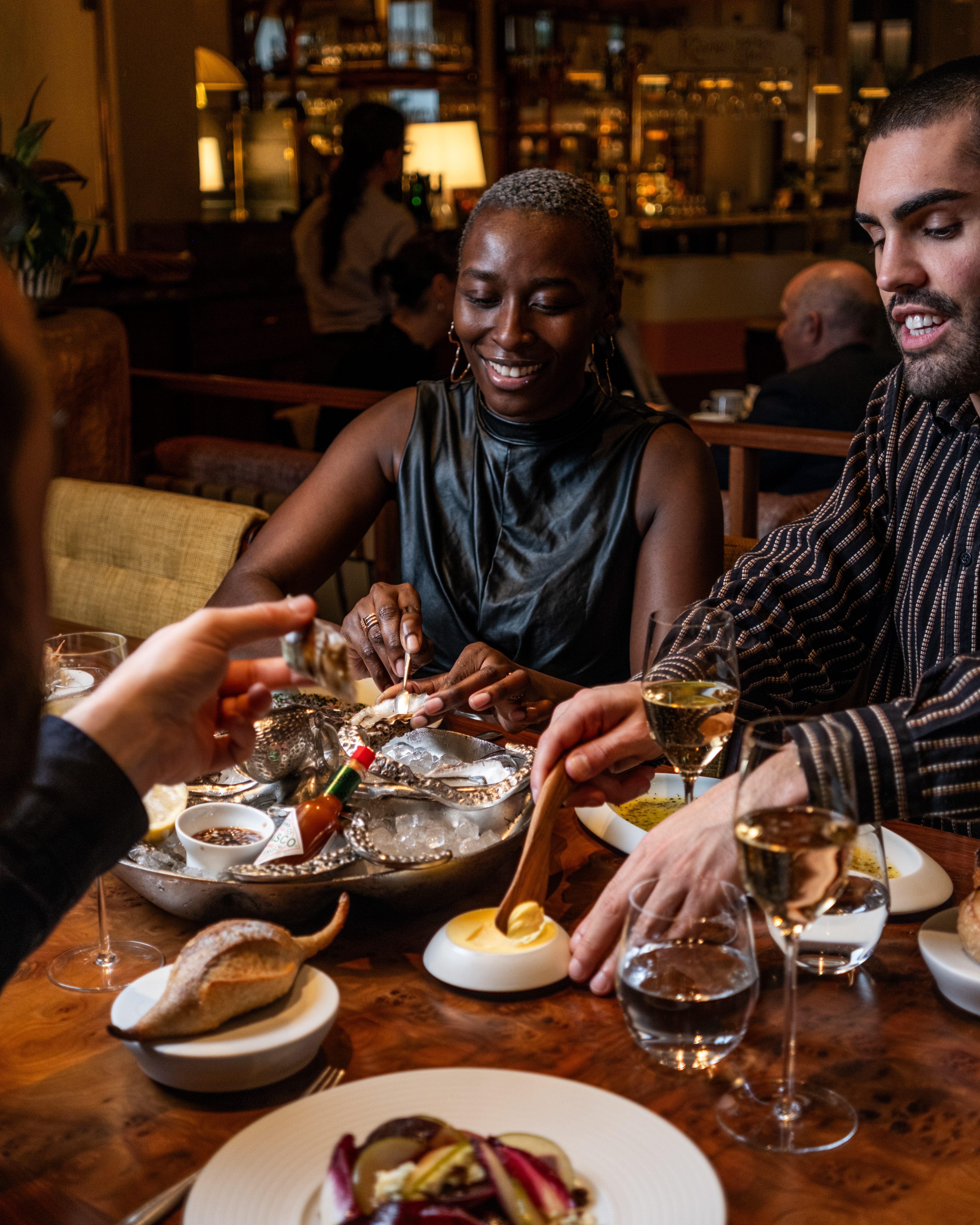 People having dinner and smiling