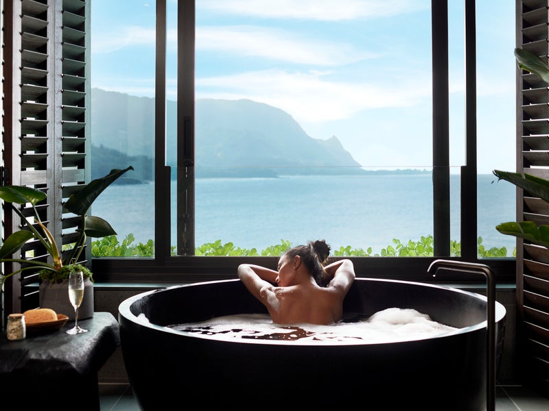 Woman relaxing in a hot tub