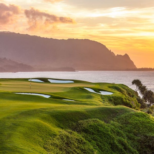 sunset over a golf course