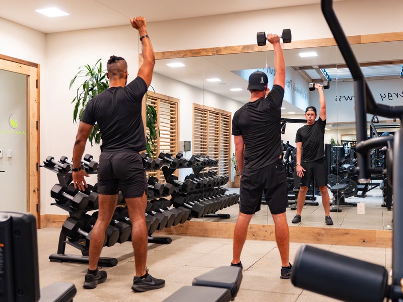 two people working out in a gym
