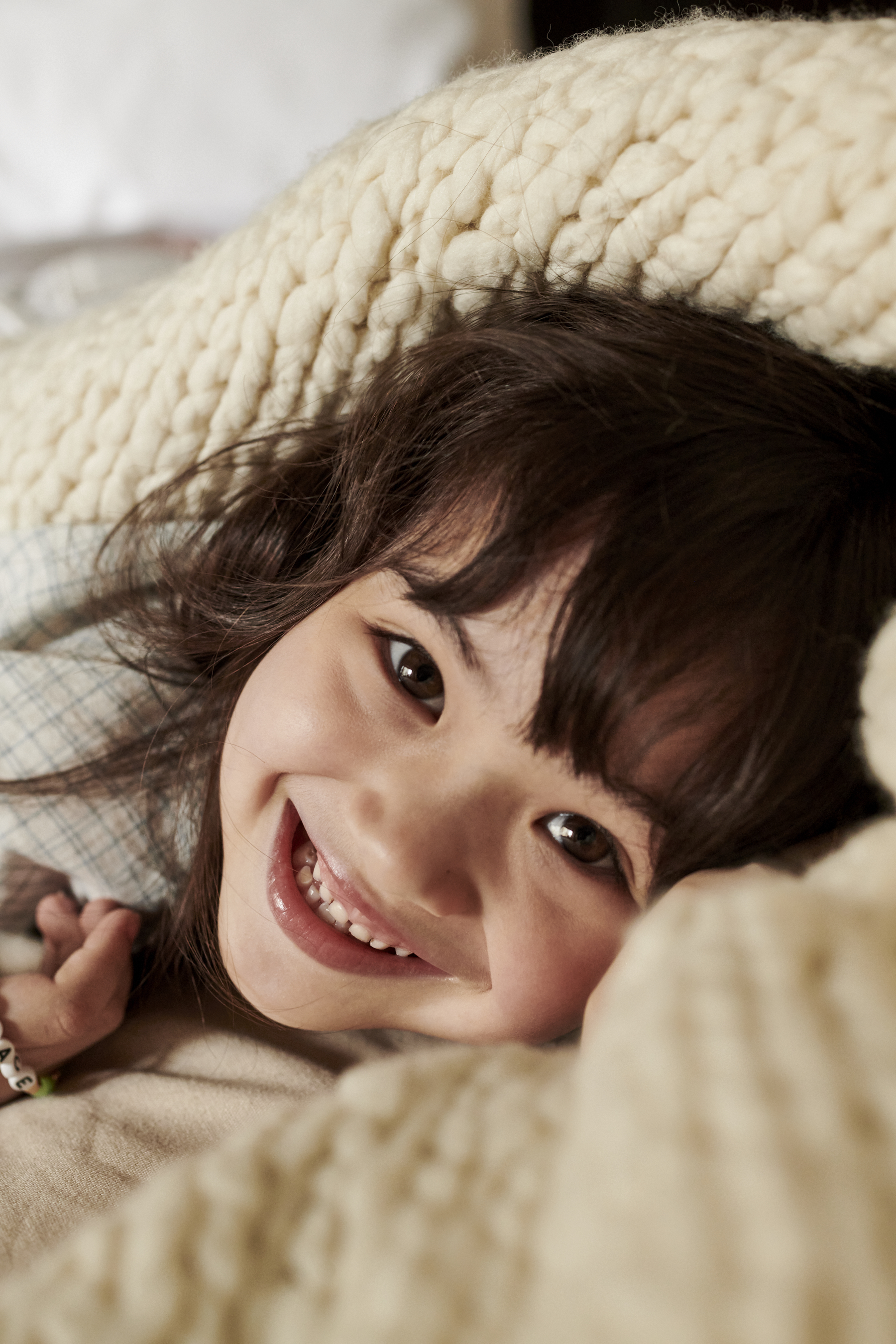 Little girl wrapped in a blanket 