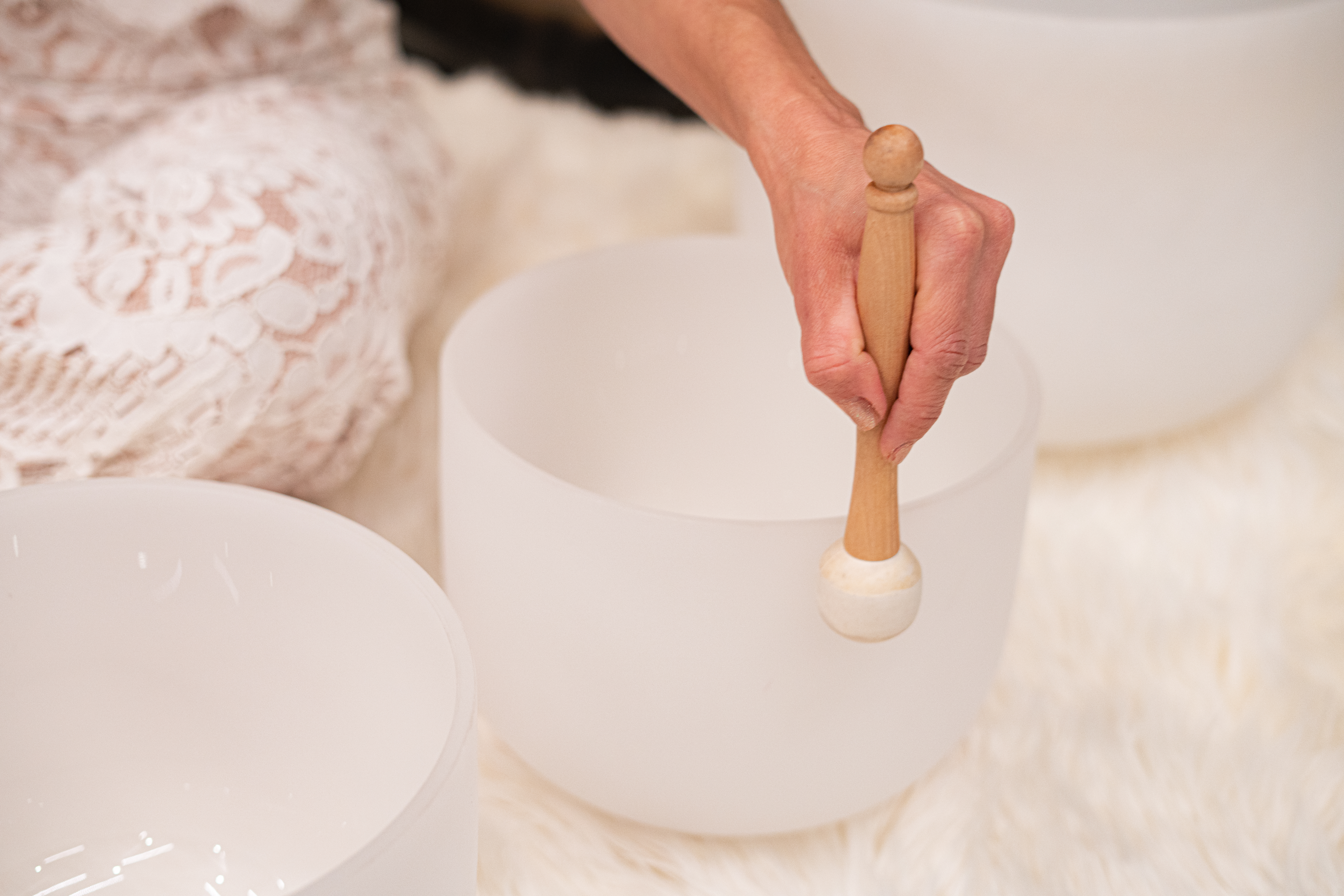 Person using a singing bowl