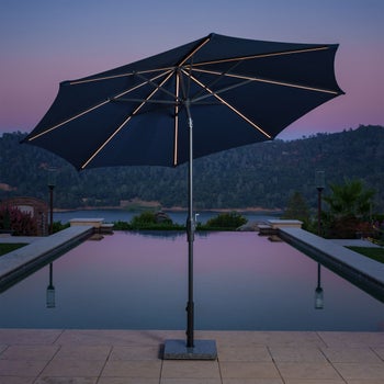 Sunvilla 10' Round Solar LED Market Umbrella, Blue | Costco