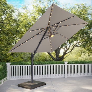 costco offset patio umbrella Seasons Sentry 10' Square Solar LED Cantilever Umbrella