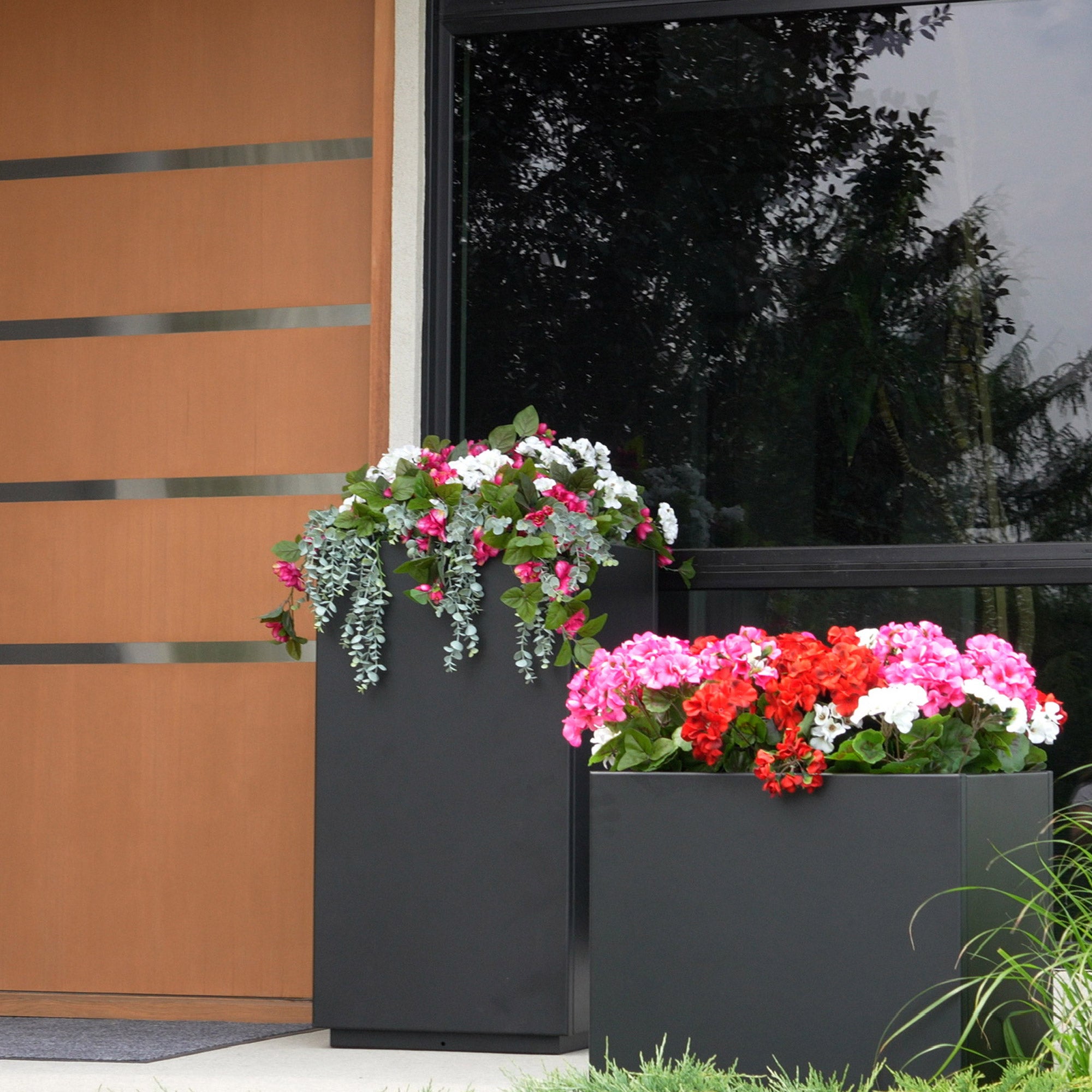 Elevate Your Outdoor Space with our Privacy Screens and Planters