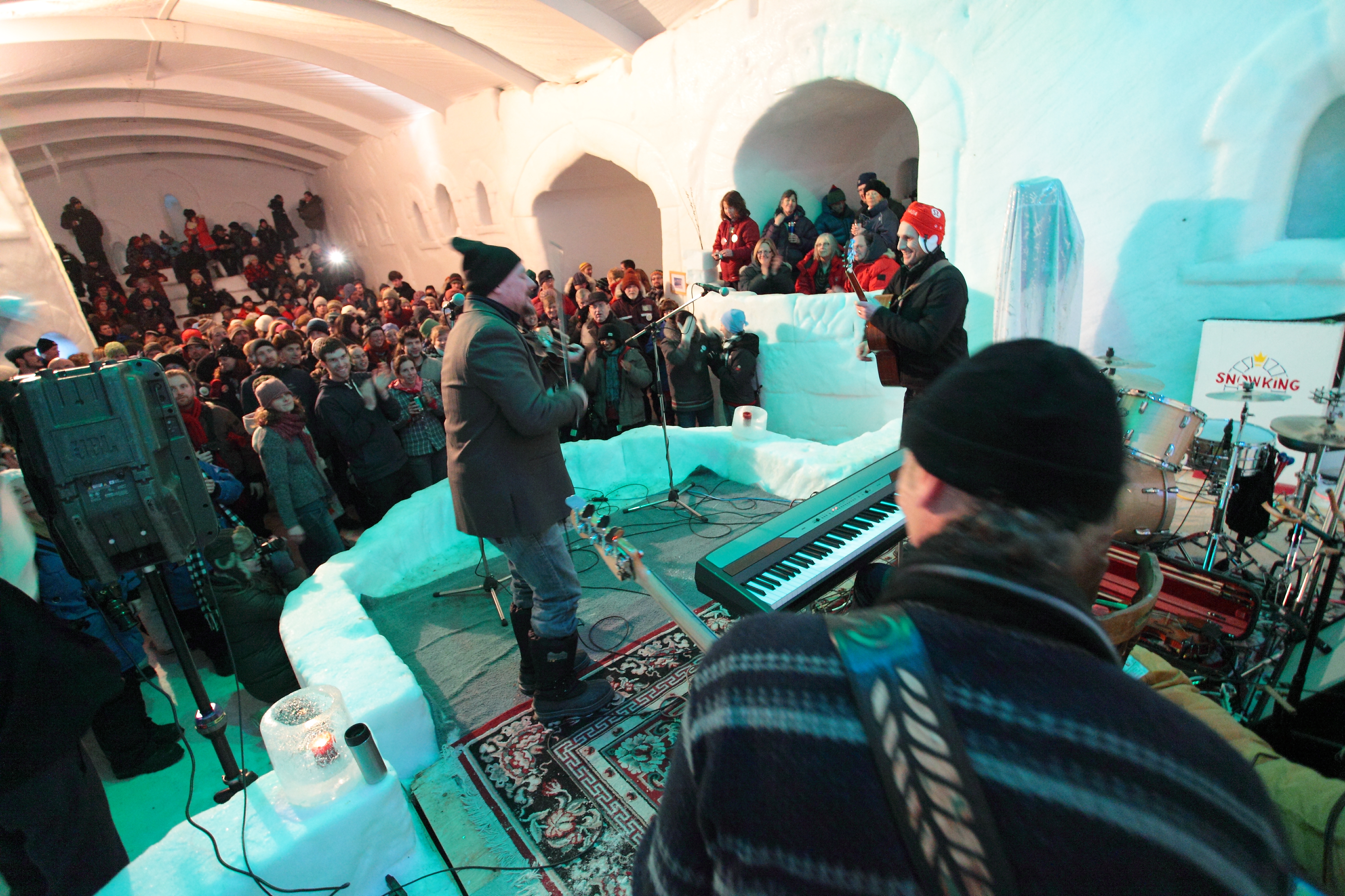People listen to a concert in the Snowking ice castle in Yellowknife