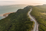 The Fundy Trail Parkway with winding drive, in park, by the seawater on Bay of Fundy coastline near St. Martins and Saint John