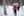 Group snowshoeing in a single file line in location in proximity to Braeburn, Yukon