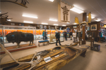People in the Churchill's Itsanitaq Museum which display Inuit carvings and artifacts 