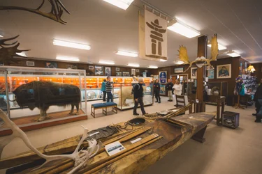 People in the Churchill's Itsanitaq Museum which display Inuit carvings and artifacts