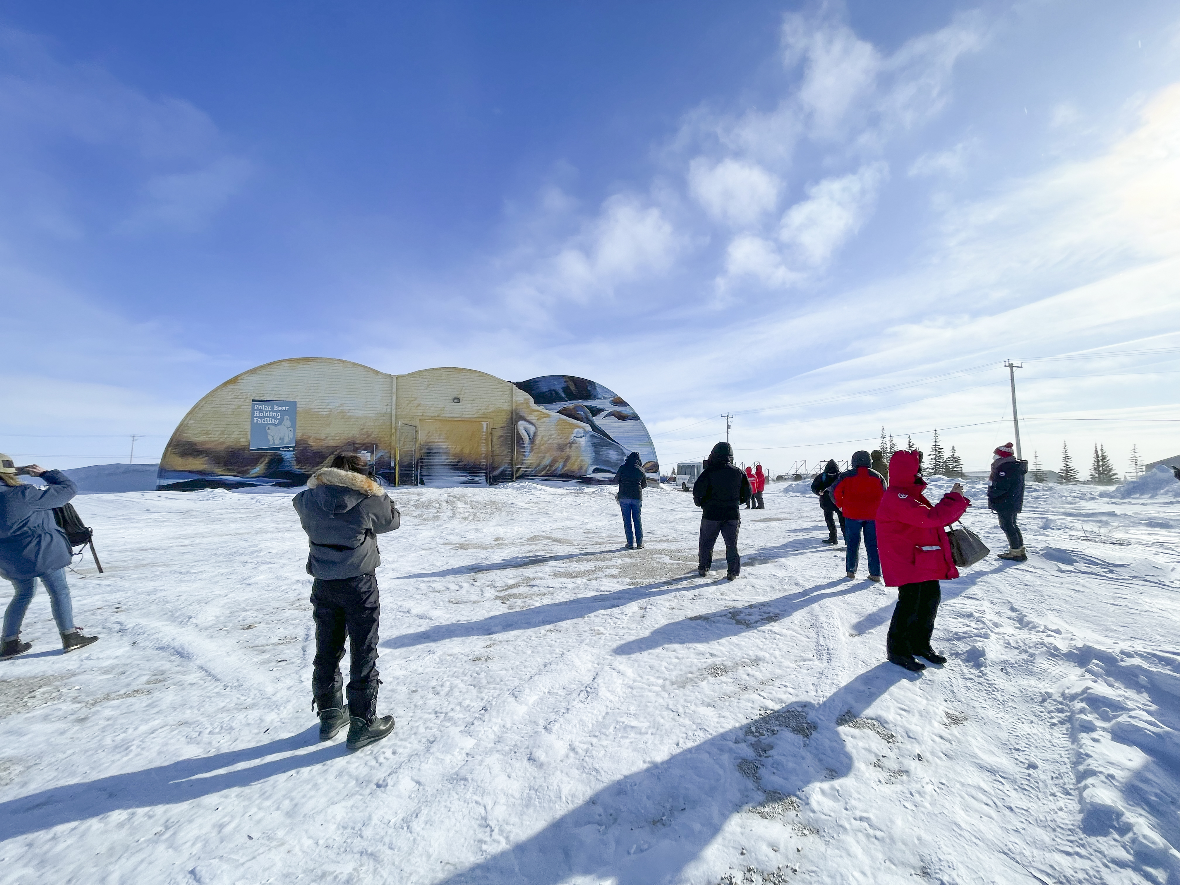 Visitors at the Polar Bear Holding Facility in the town of Churchill, Manitoba