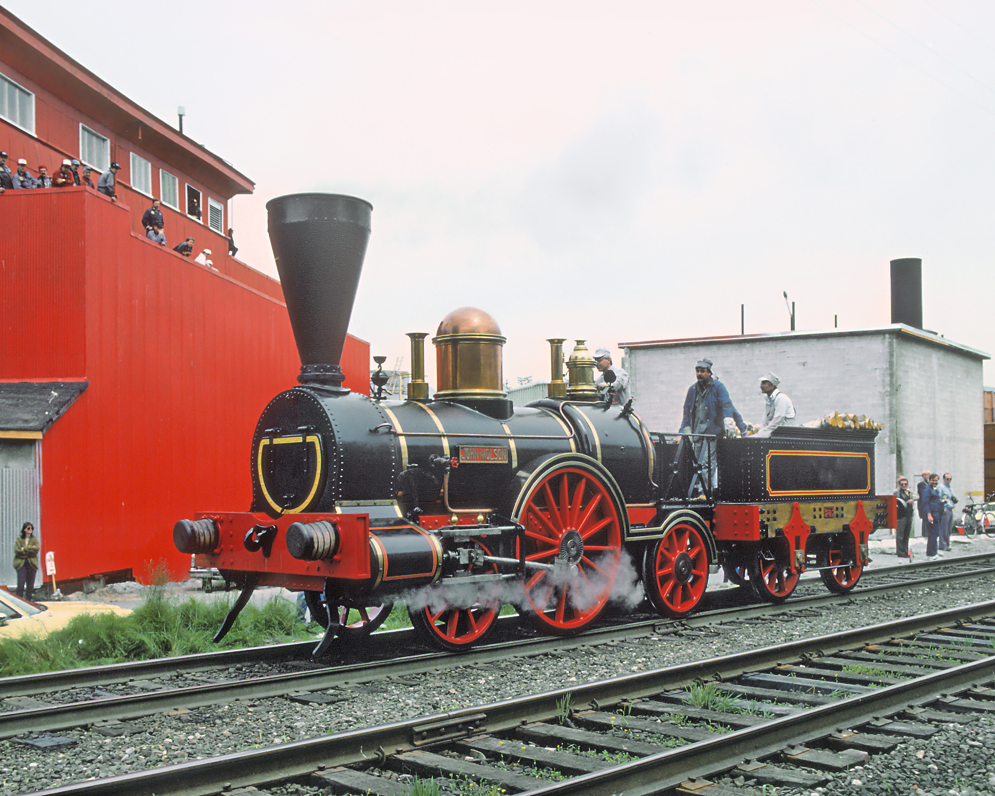 A classic locomotive is presented at a World's Fair in Vancouver
