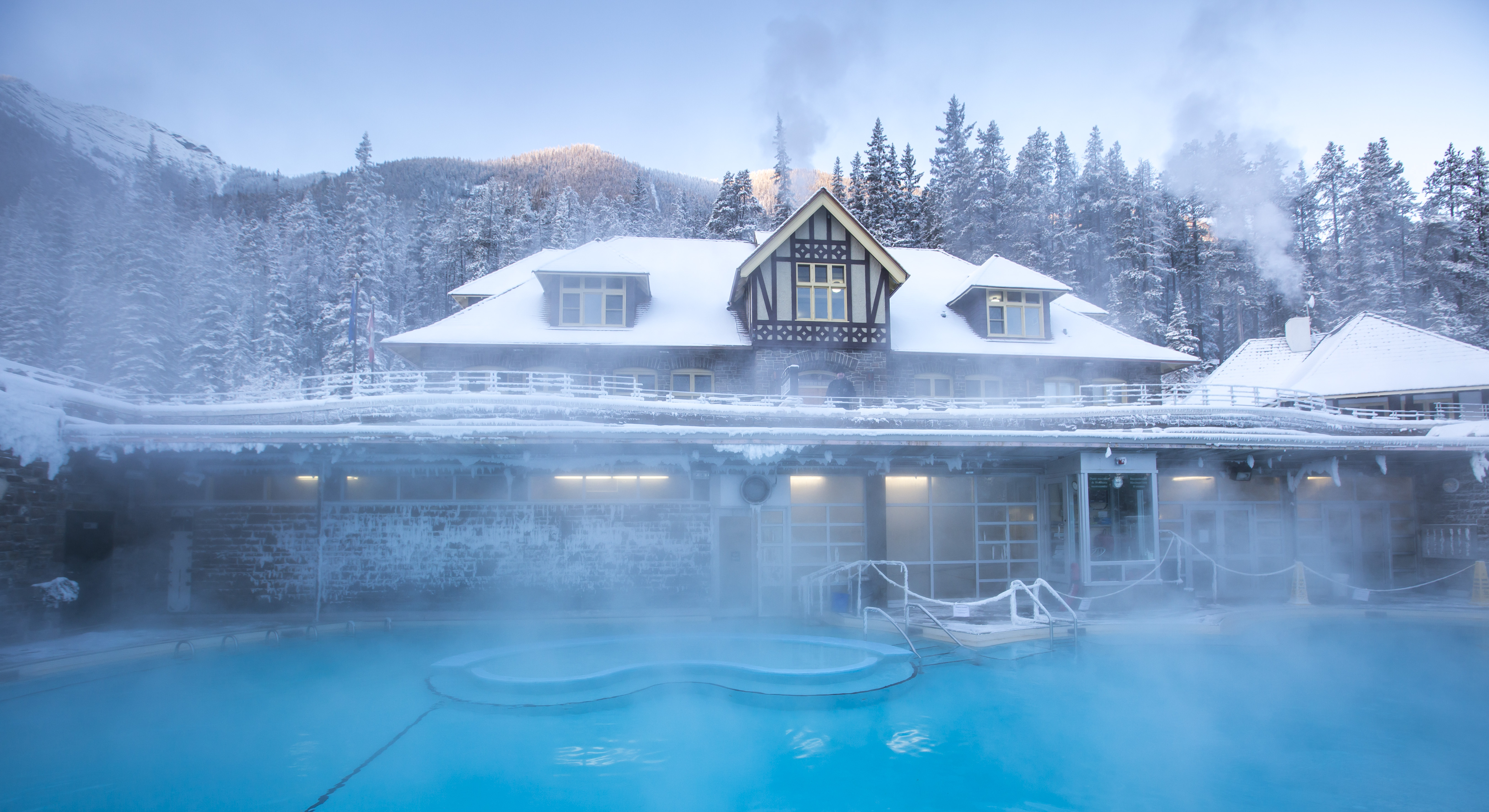 Wintry mountain scenery from the Banff Upper Hot Springs pool and bathhouse