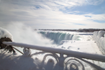 Frozen Niagara Falls and snowy surroundings