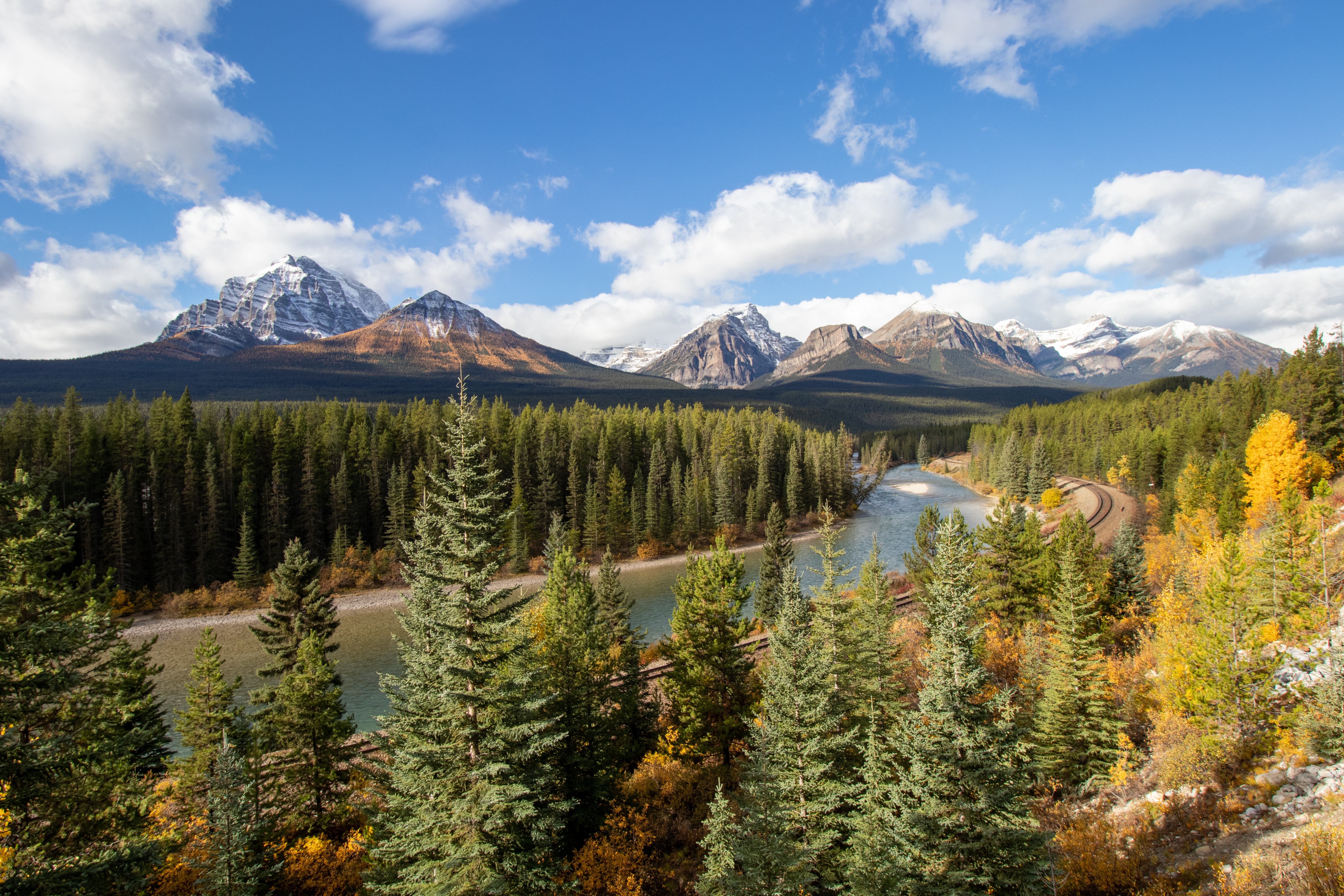 Fall in Morant's Curve viewpoint near train tracks along The Bow River in Alberta's Banff National Park