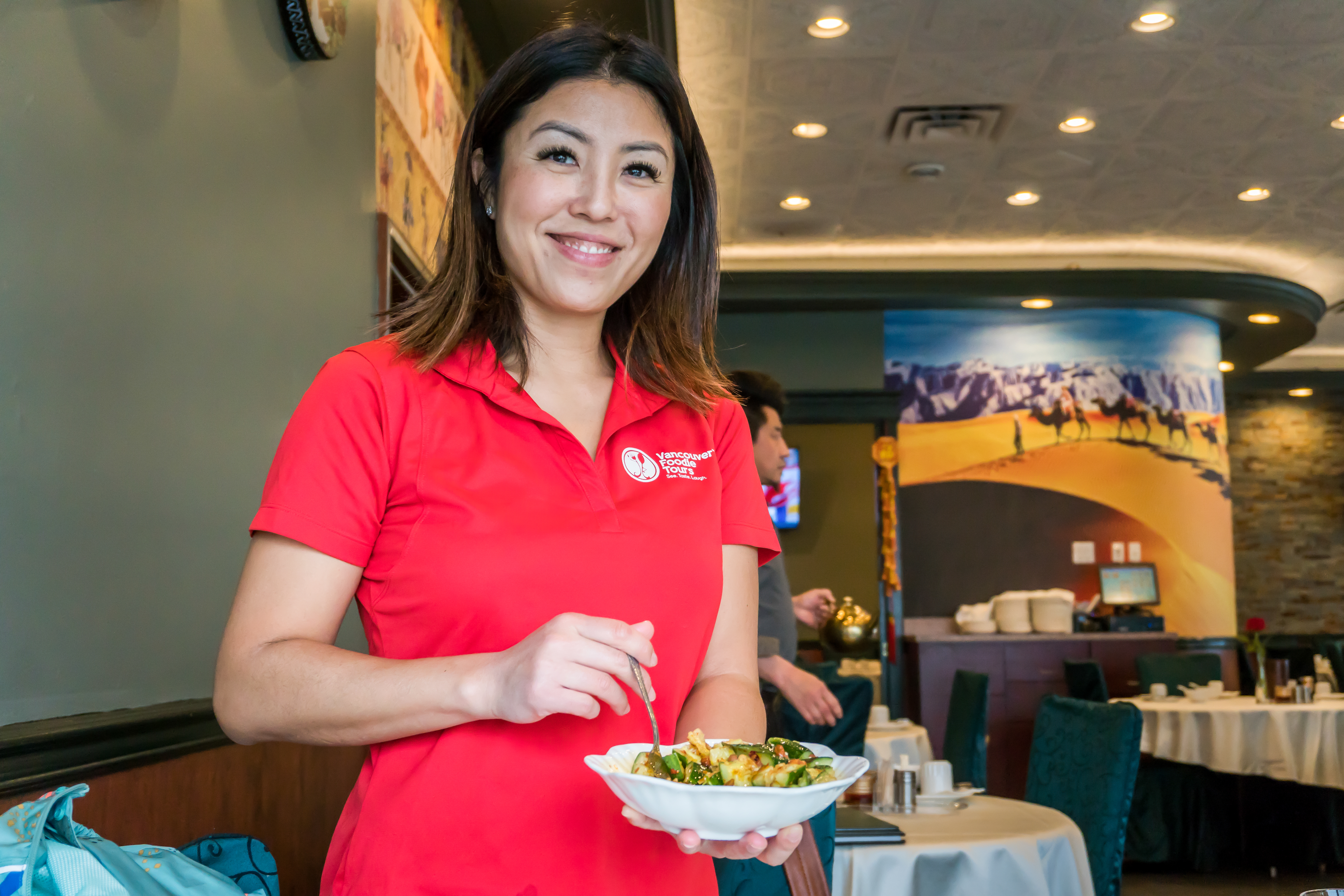 Michelle Ng, wonder of Vancouver Foodie Tours, leading a tour.
