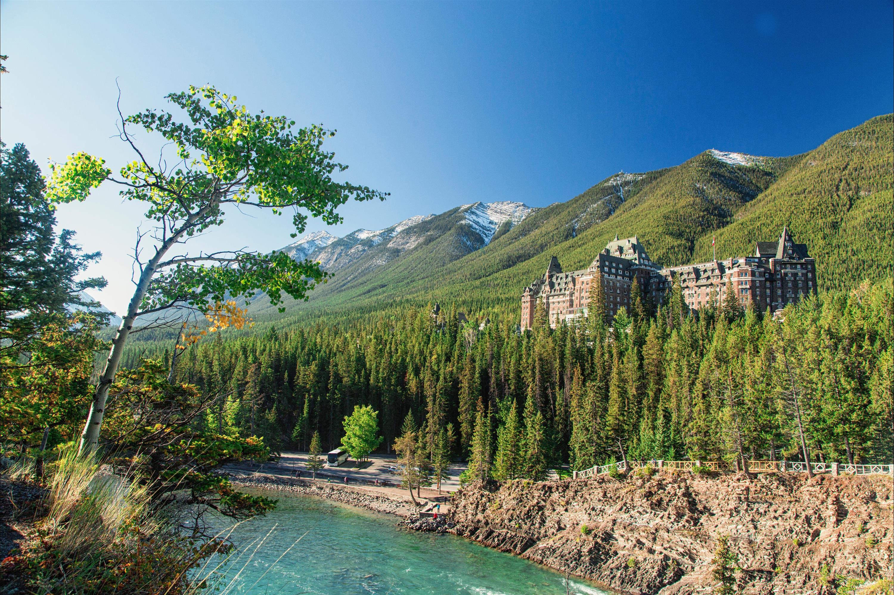 Fairmont Banff Springs with mountains and river
