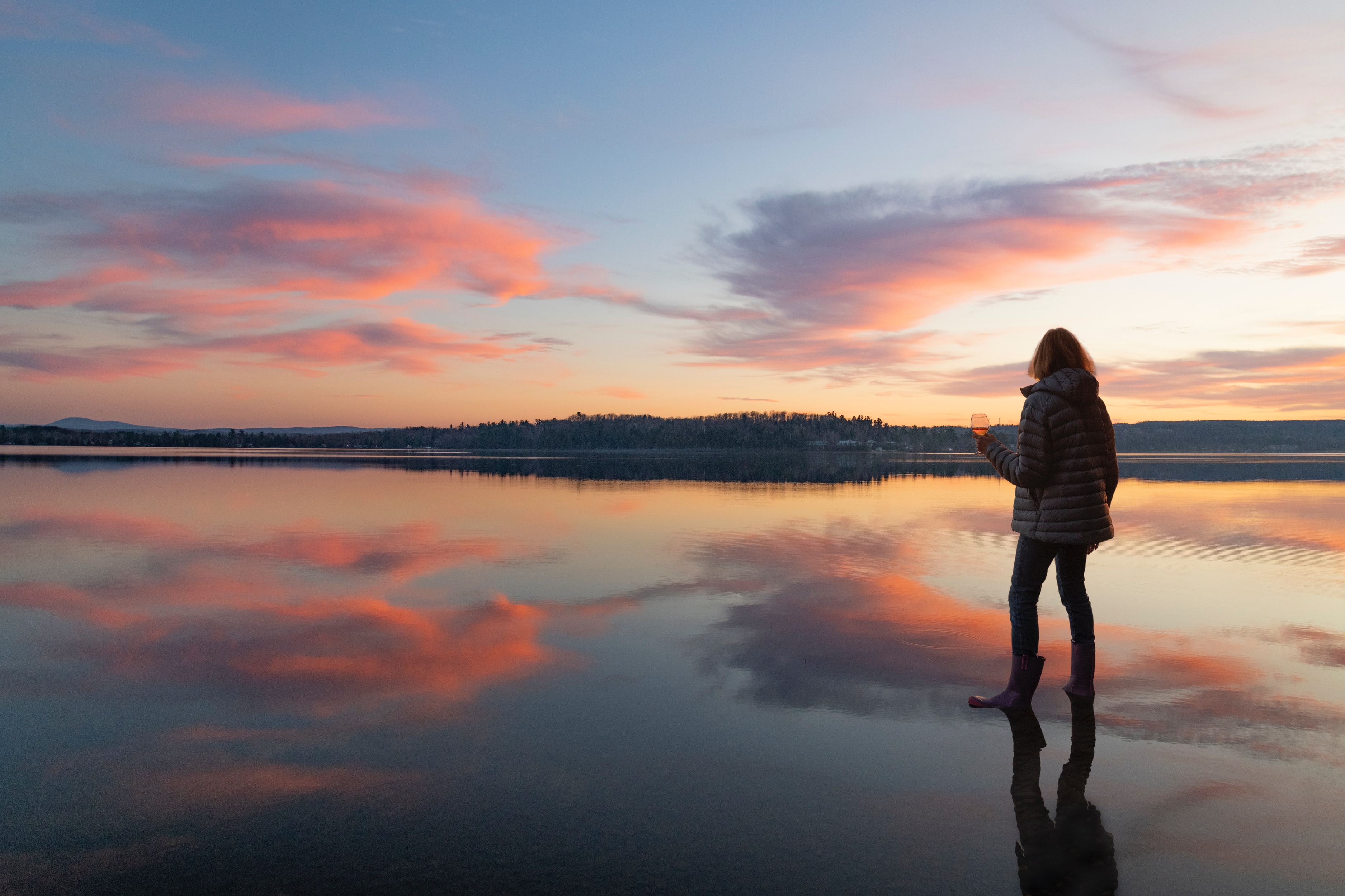 Women standing near Lake Massawippi, Quebec