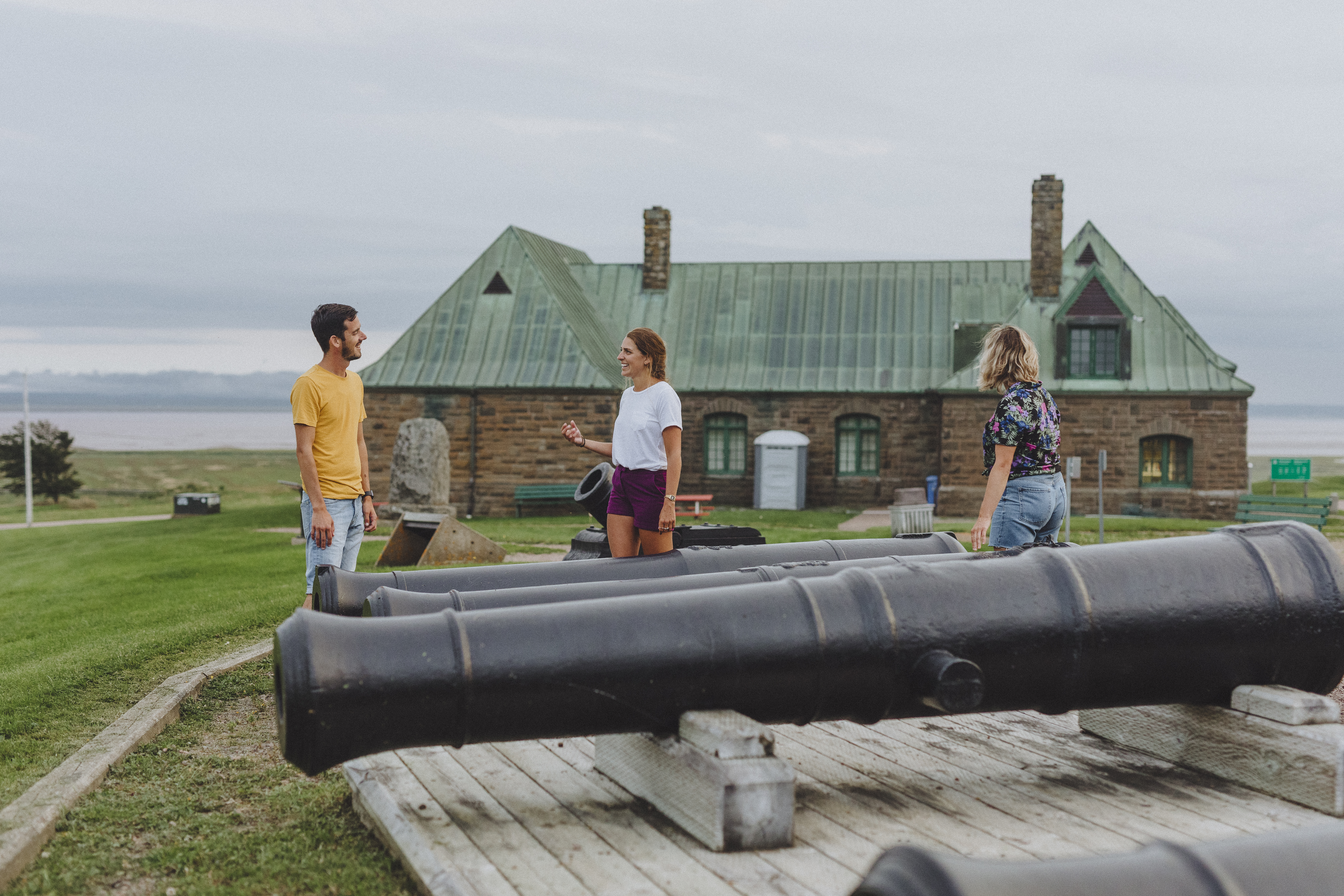 Visitors chat by fortress’ artillery located in historical site