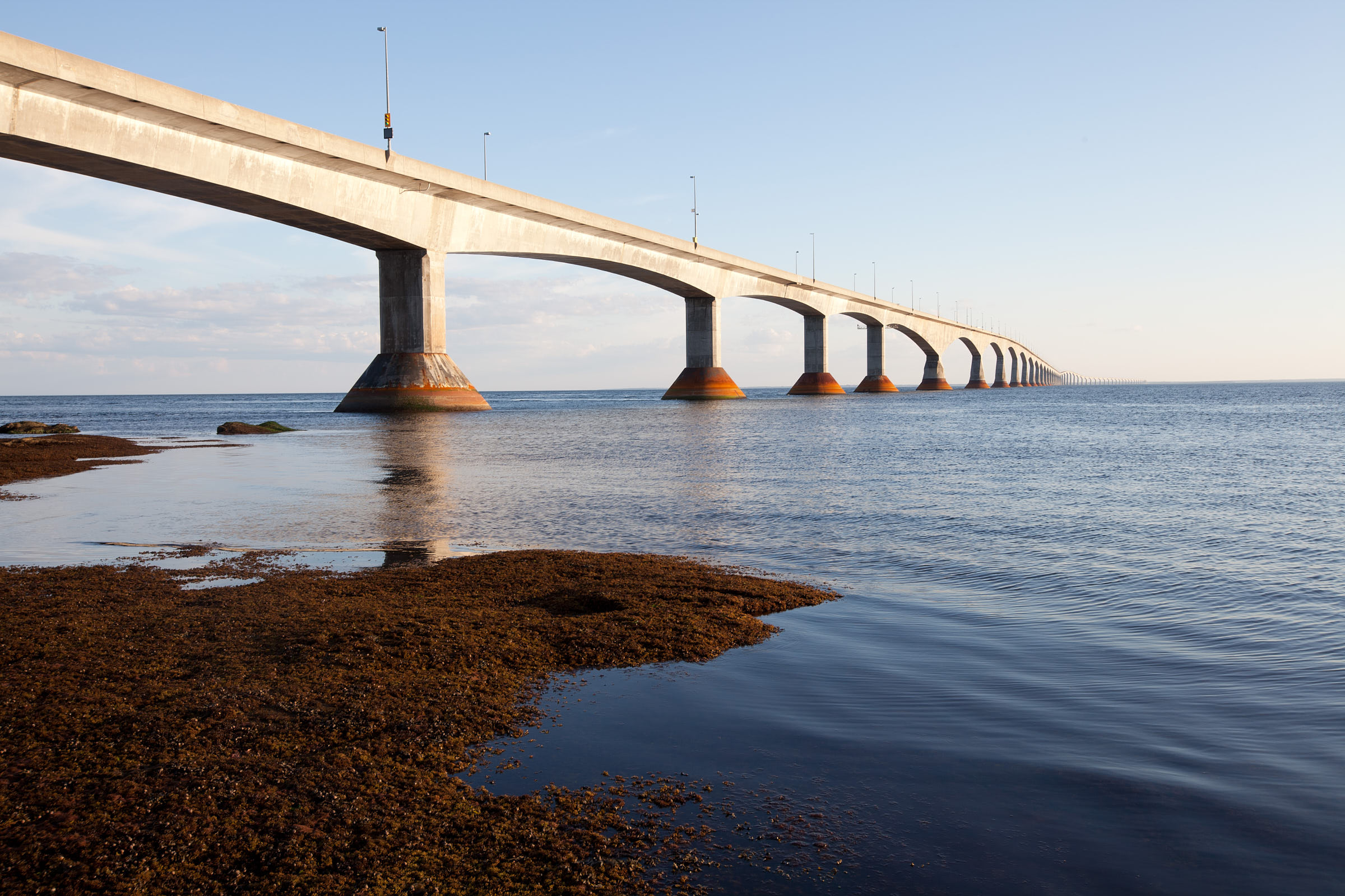 Long toll bridge connecting Prince Edward Island to mainland New Brunswick stretches across water
