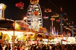 The amusement rides and lights of the Canadian National Exhibition at night