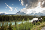 Rocky Mountaineer train going around Morant's Curve in the Canadian Rockies