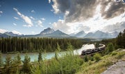 Rocky Mountaineer train going around Morant's Curve in the Canadian Rockies
