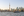 A Toronto Islands ferry sails past the Toronto city skyline and CN Tower