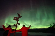 Two people staring at Northern Lights