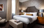 Fairmont room with king bed and elegant decorations at Fairmont Palliser