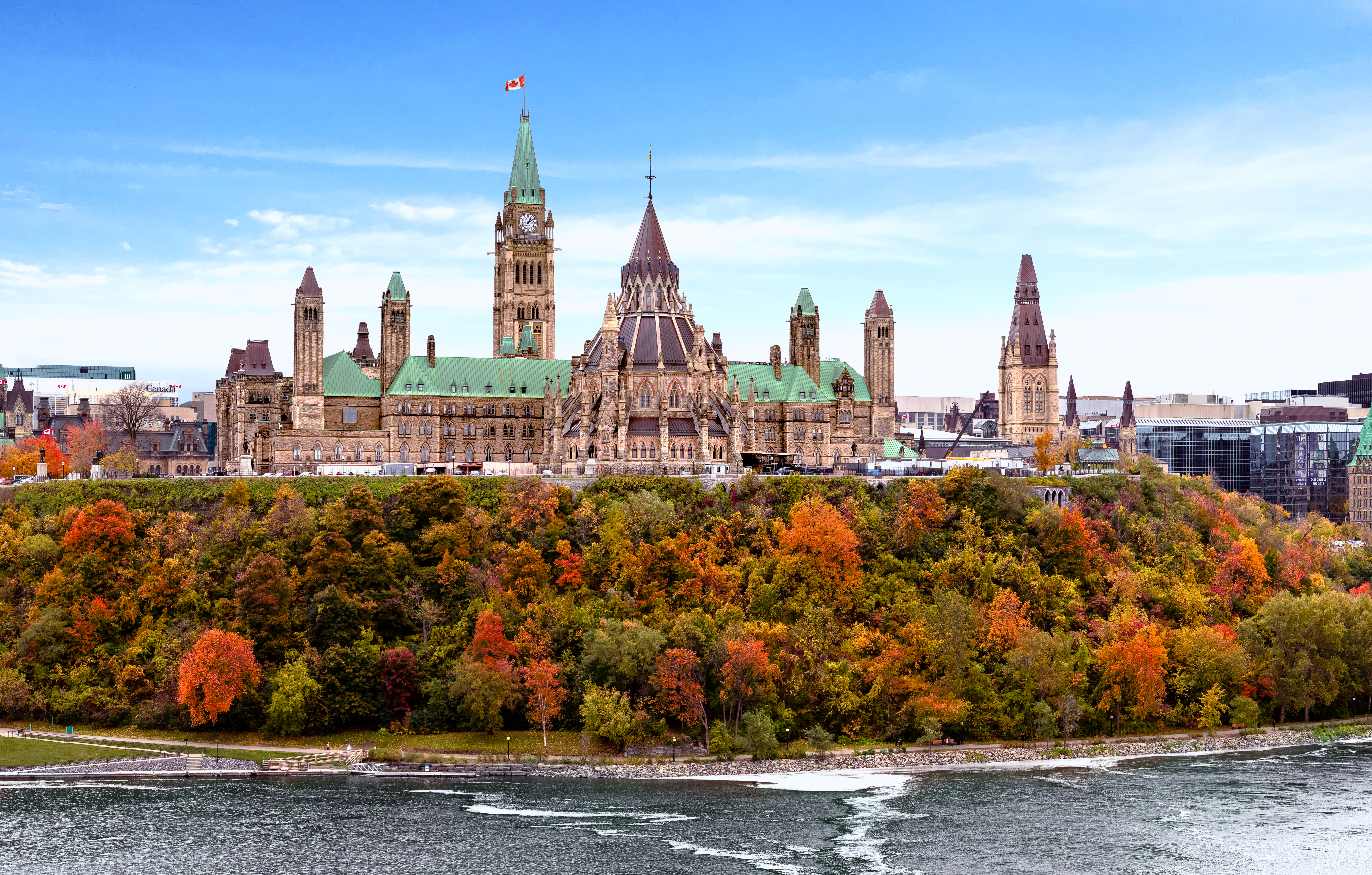 Parliament Hill in fall form the river, Ottawa