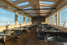 Sun shining into the dining space on the Tundra Buggy Lodge in Churchill