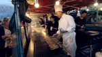 chef grills skewers at Richmond Night Market