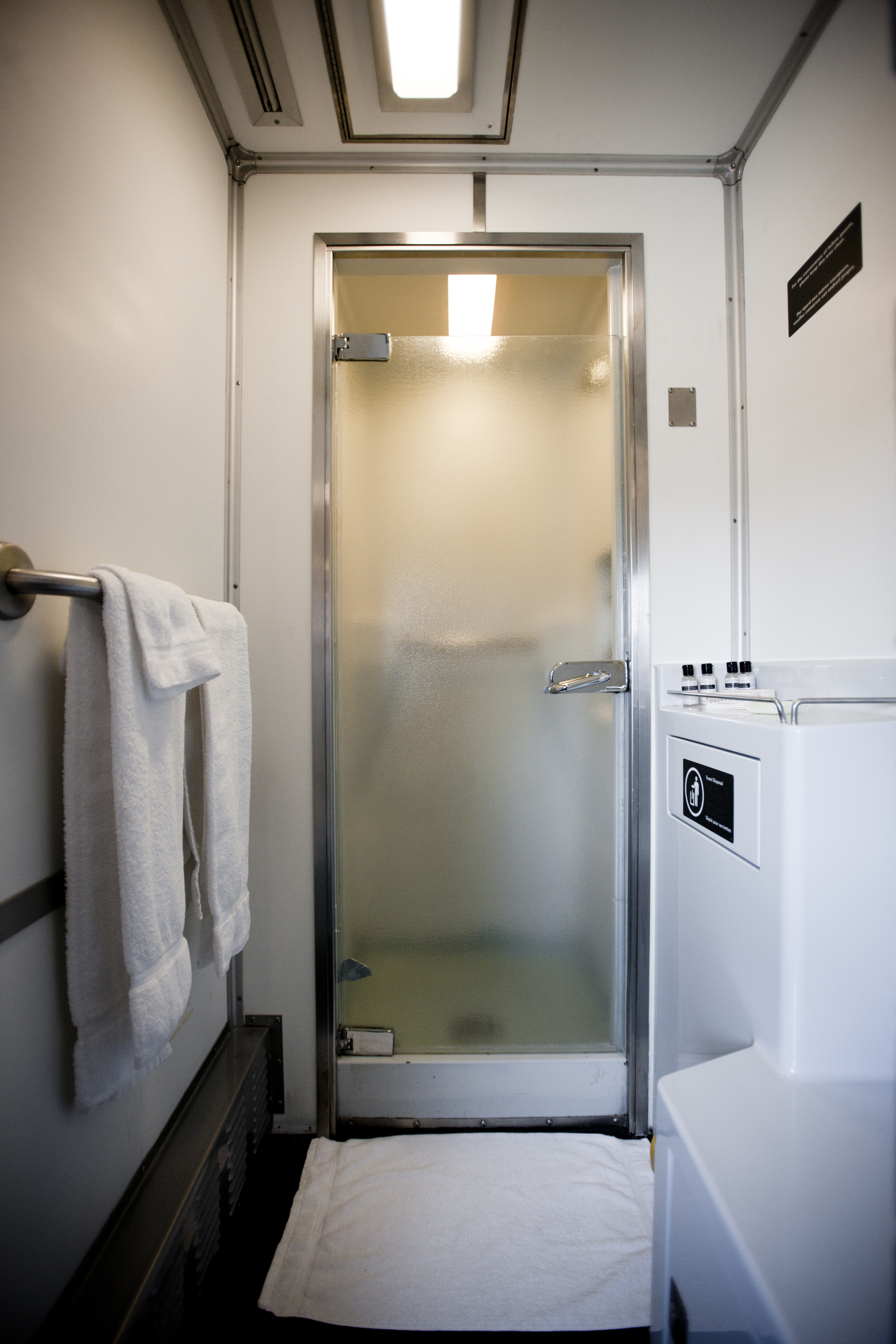 VIA Rail sleeper car shower area and stall.