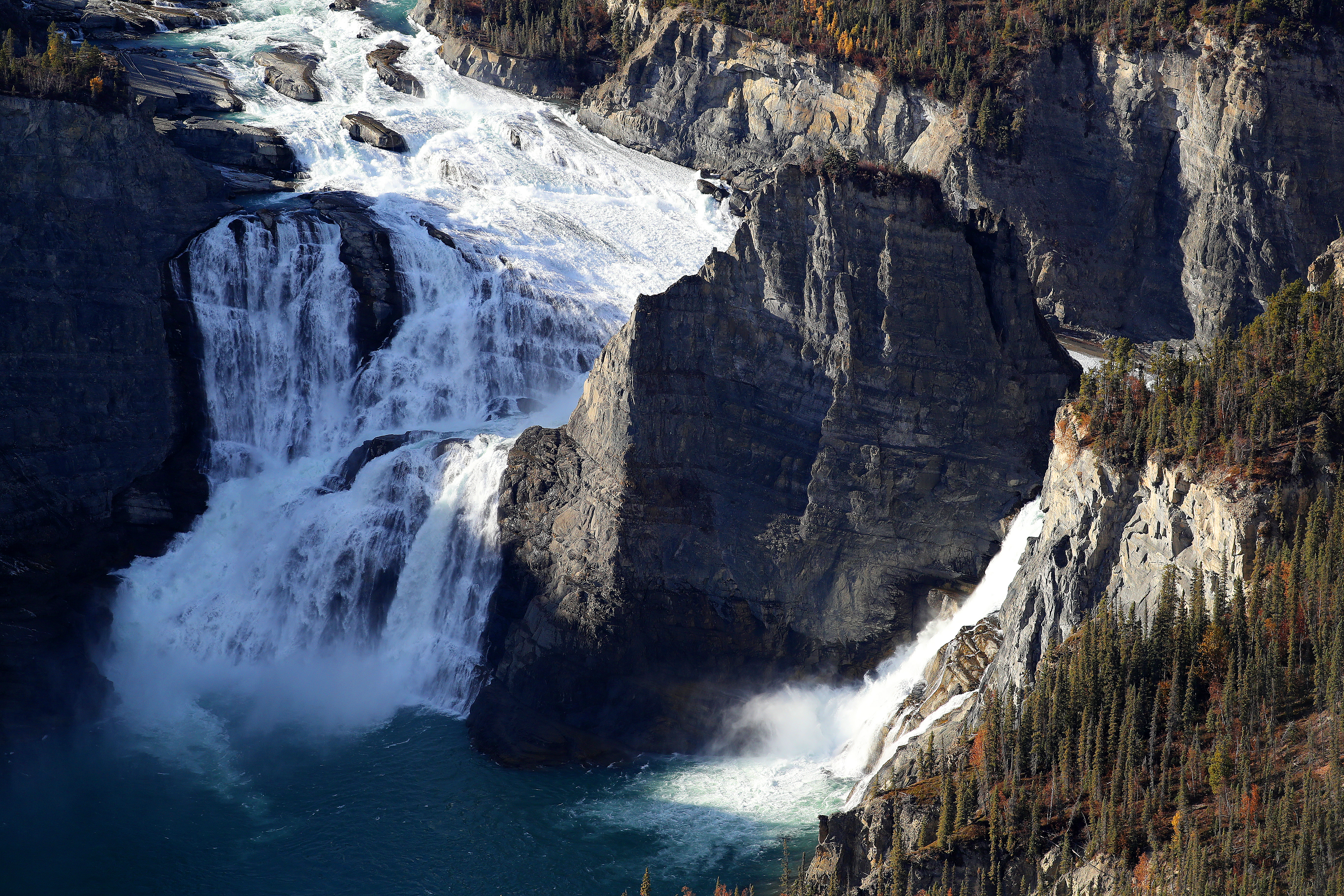 Rushing waterfall in a canyon