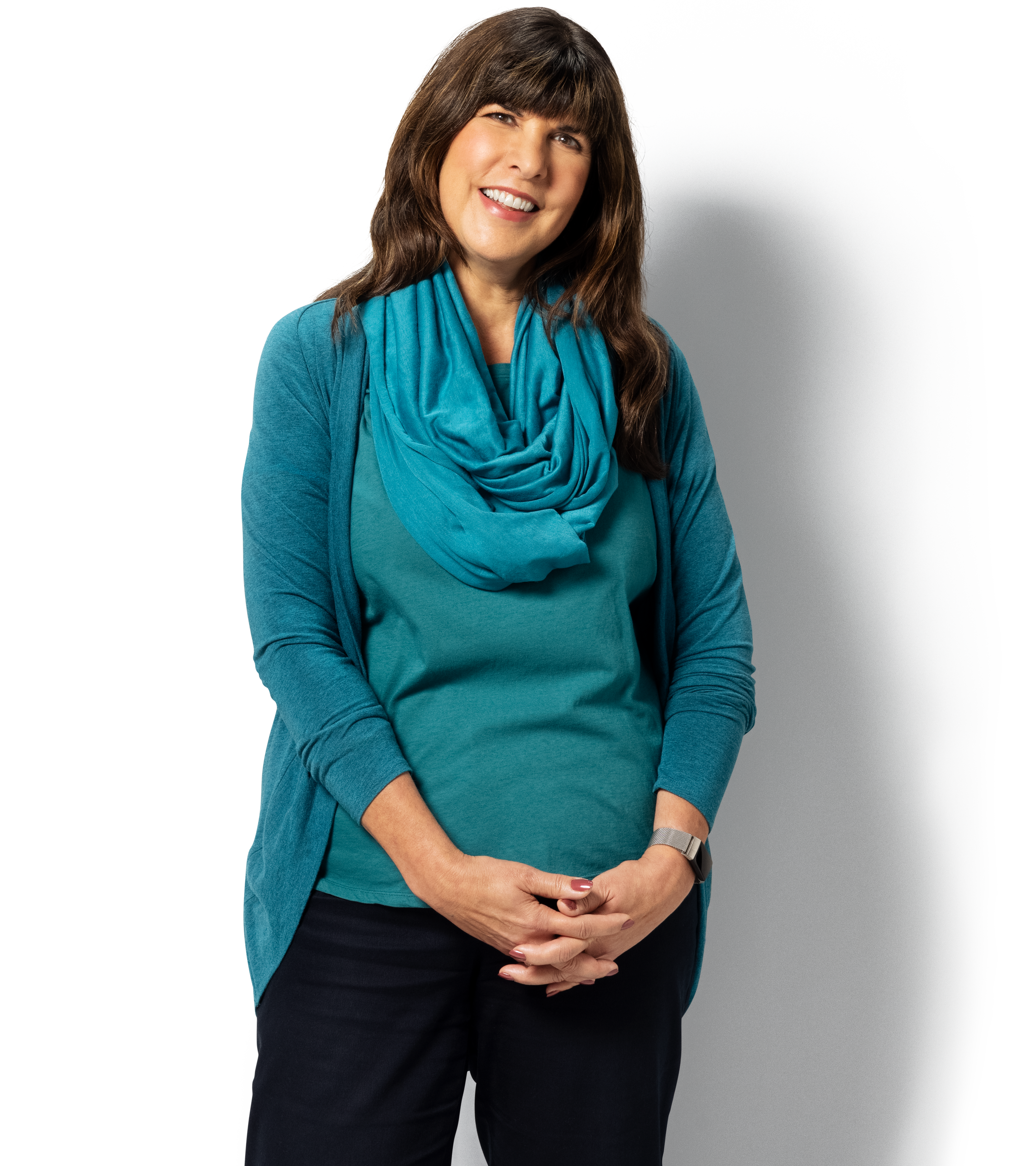 Man standing and smiling at the camera