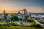 View of Chateau Frontenac and Quebec City skyline at sunset 