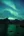 Three green streaks of the aurora borealis above Grizzly Lake, Tombstone Territorial Park, Yukon Territory
