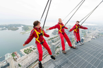 Three friends experience the Edgewalk at the CN Tower
