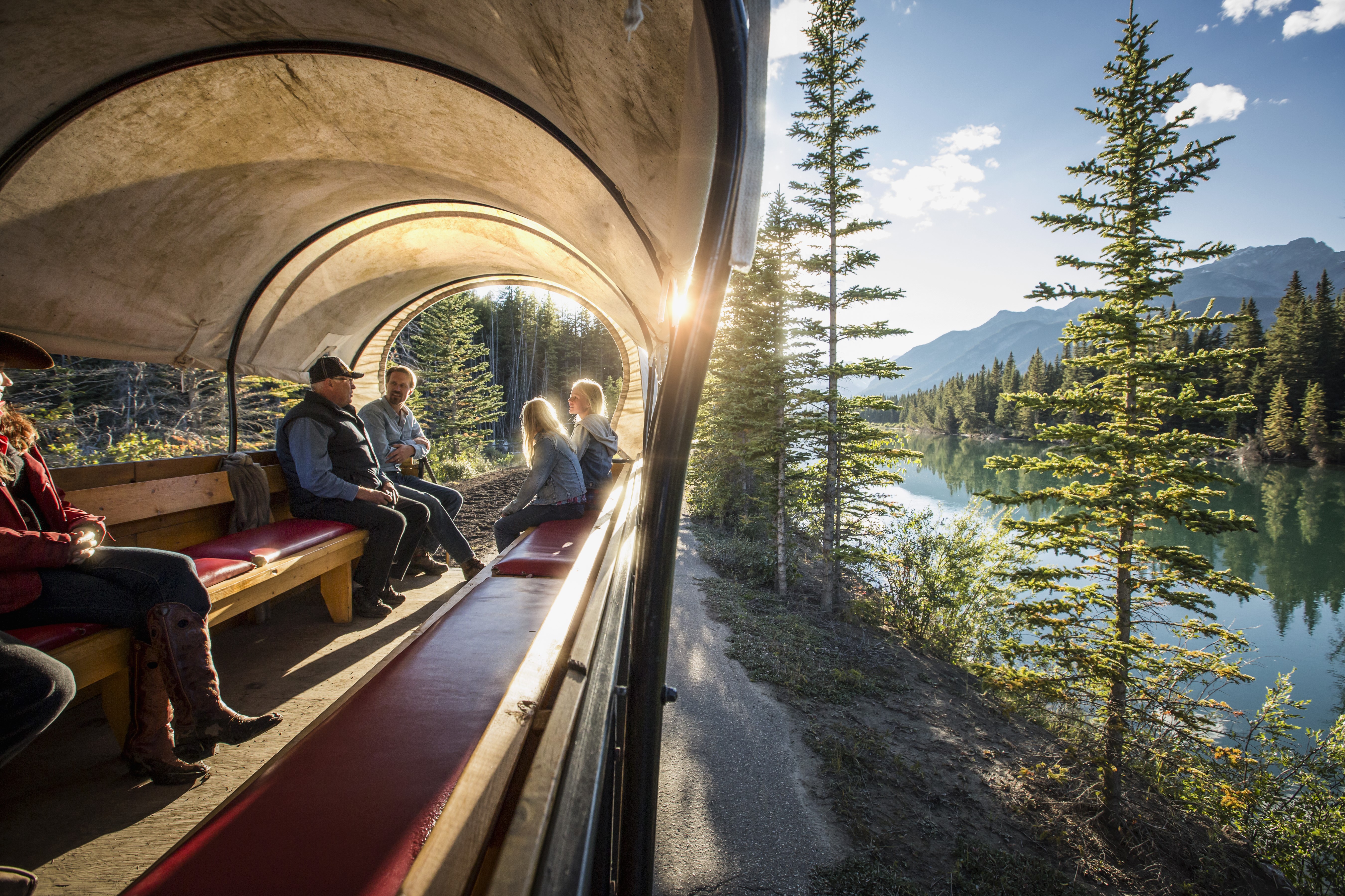 Small group in covered wagon
