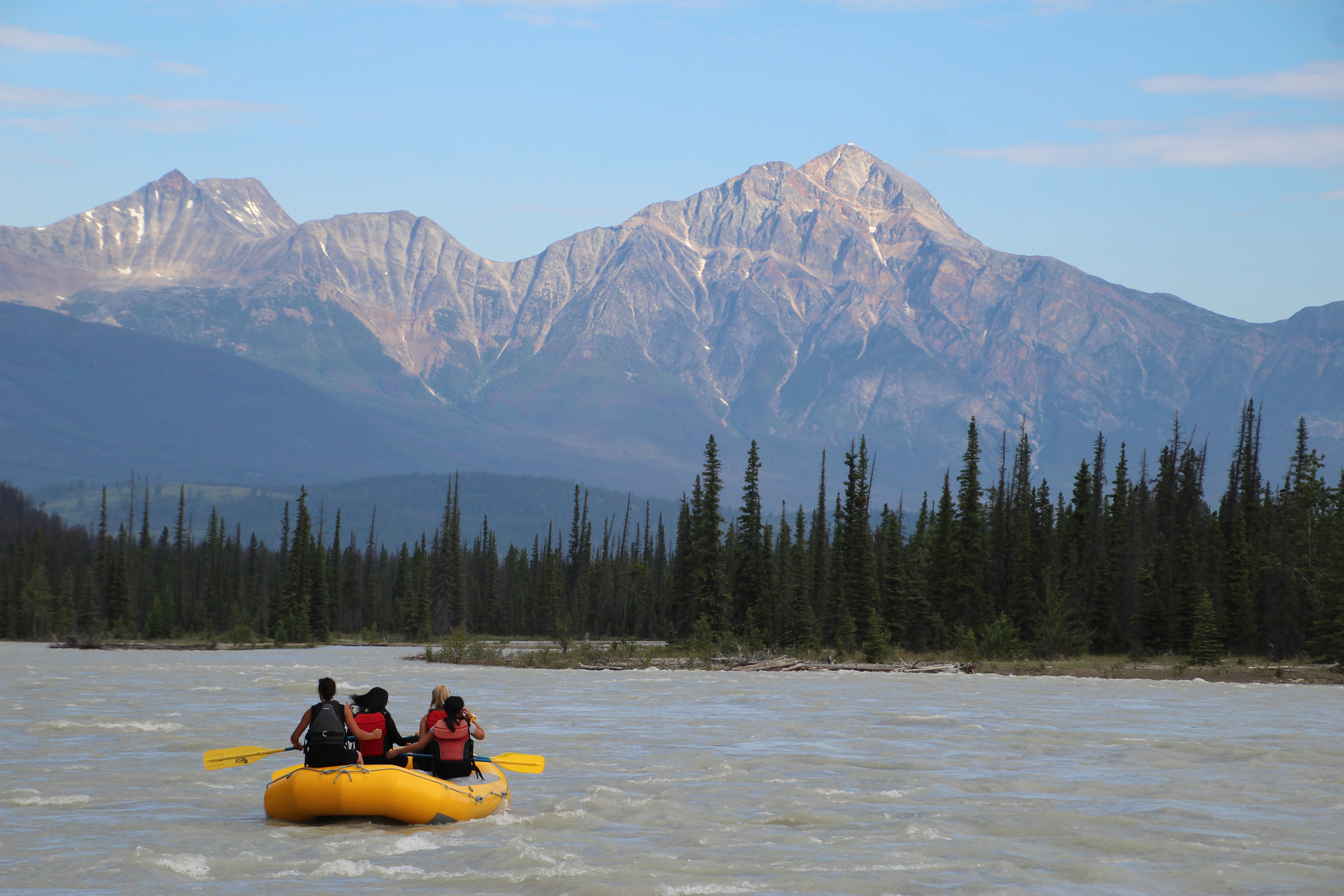 Whitewater rafting on Athabasca river Jasper National Park in the Canadian Rockies  