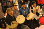 Indigenous peoples gather and play drums in Northwest Territories, Canada 
