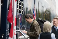 Man boarding the Rocky Mountaineer train in Vancouver